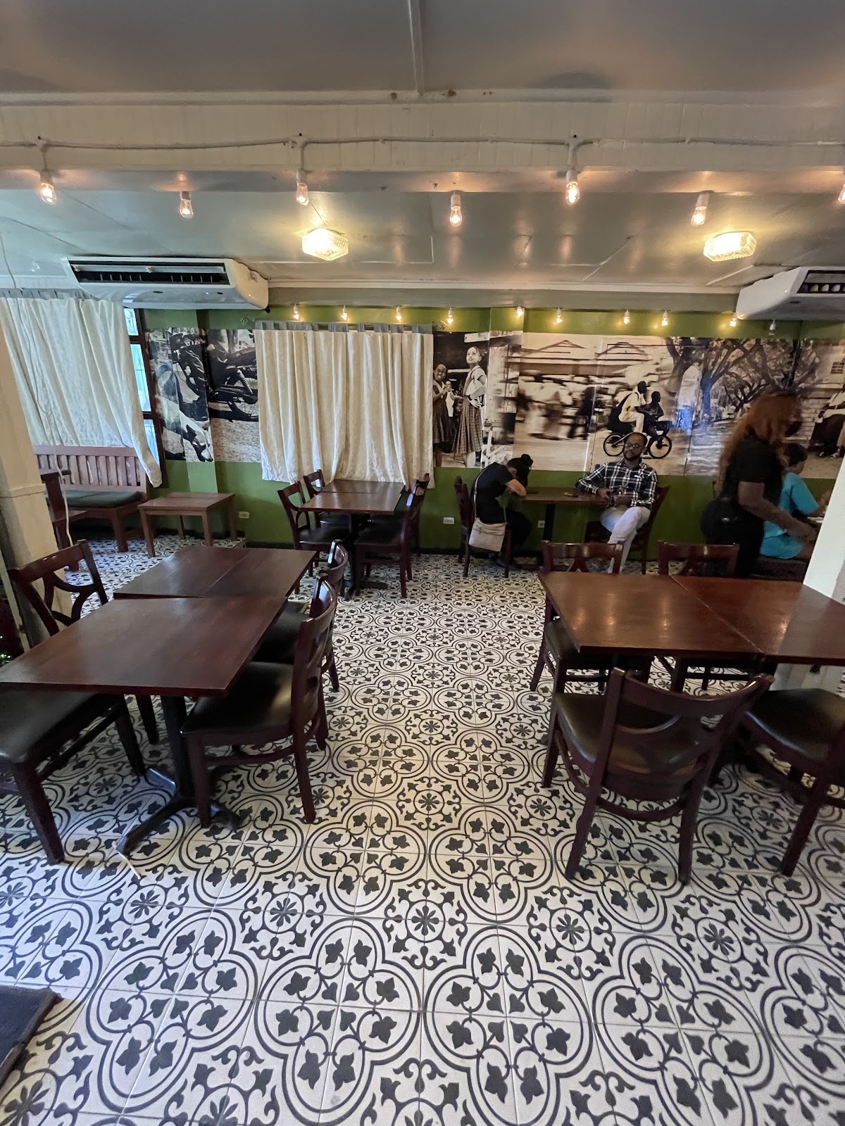 Oasis Cafe library room with patterned tiles